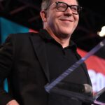 Greg Gutfeld speaking at an event