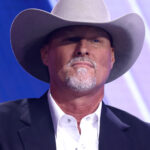 Mark Lamb, former sheriff of Pinal County, Arizona, in a cowboy hat, speaking at an event.