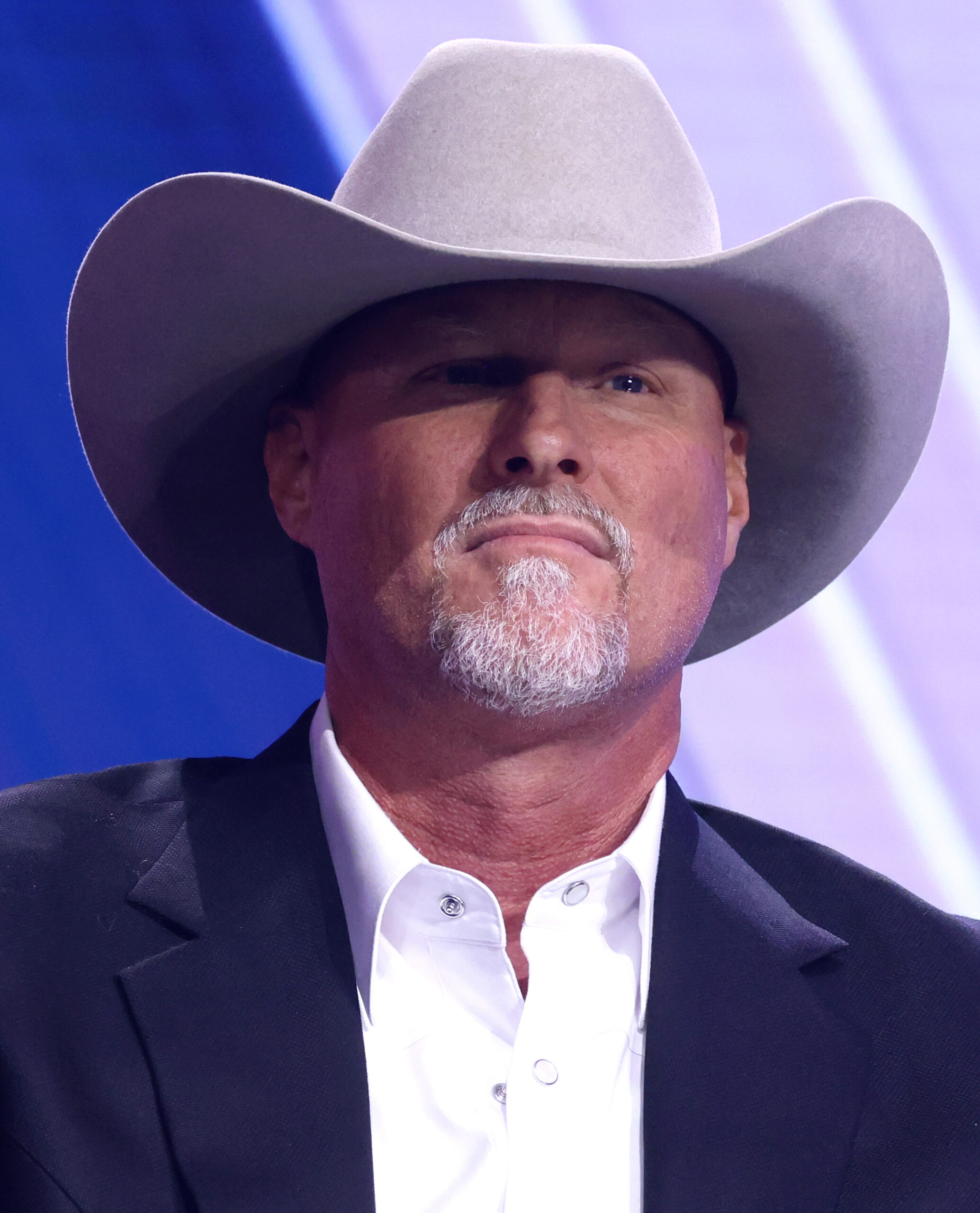 Mark Lamb, former sheriff of Pinal County, Arizona, in a cowboy hat, speaking at an event.