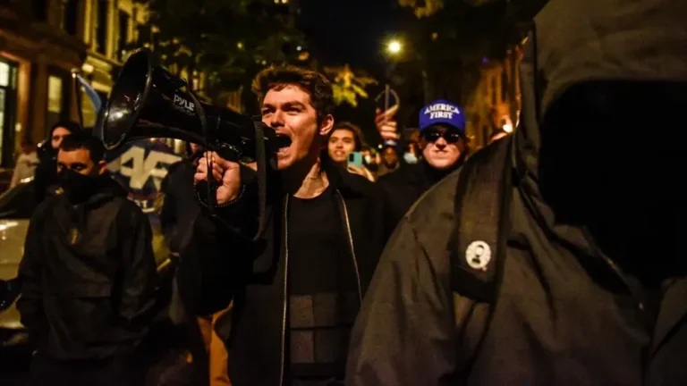 Nick Fuentes, the white-nationalist streamer whose online following calls itself the groypers, speaking into a microphone.