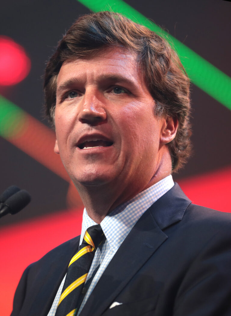 Tucker Carlson speaking at an event in December 2020.