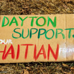 Demonstrators at a Dayton, Ohio rally in September 2024 standing in solidarity with Haitian immigrants in Springfield