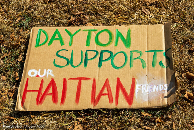 Demonstrators at a Dayton, Ohio rally in September 2024 standing in solidarity with Haitian immigrants in Springfield