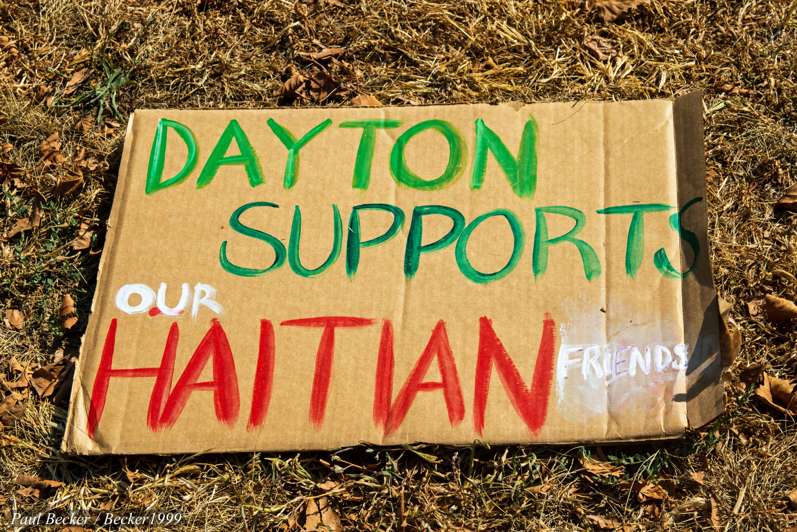 Demonstrators at a Dayton, Ohio rally in September 2024 standing in solidarity with Haitian immigrants in Springfield