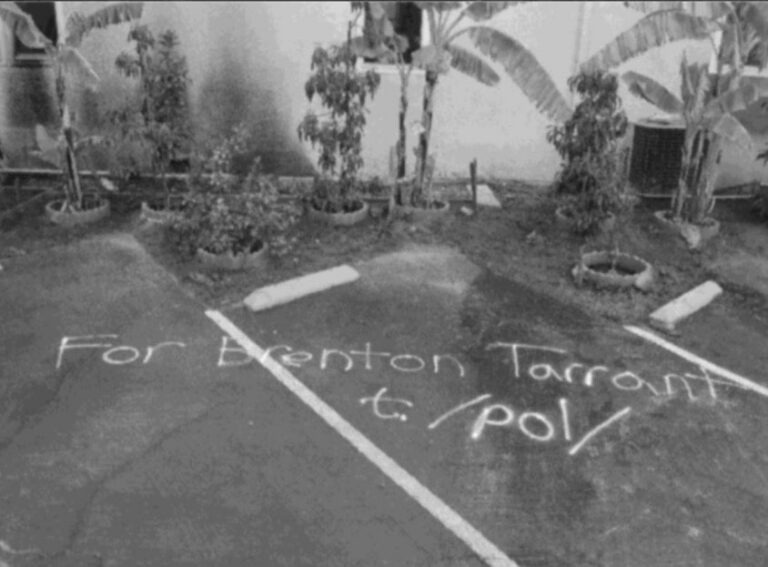 Federal investigators' photograph of graffiti left at the Dar-ul-Arqam mosque in Escondido, California, after an attempted arson in March 2019