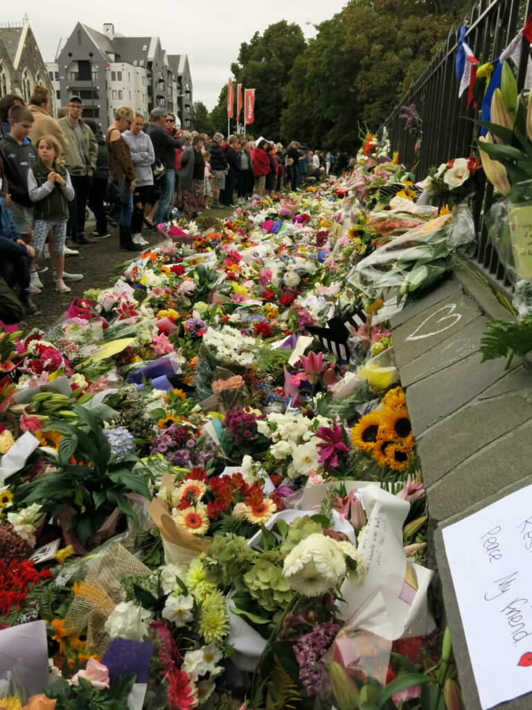 Flowers and handwritten tributes left for the victims of the Christchurch mosque shootings on Rolleston Avenue, Christchurch, New Zealand