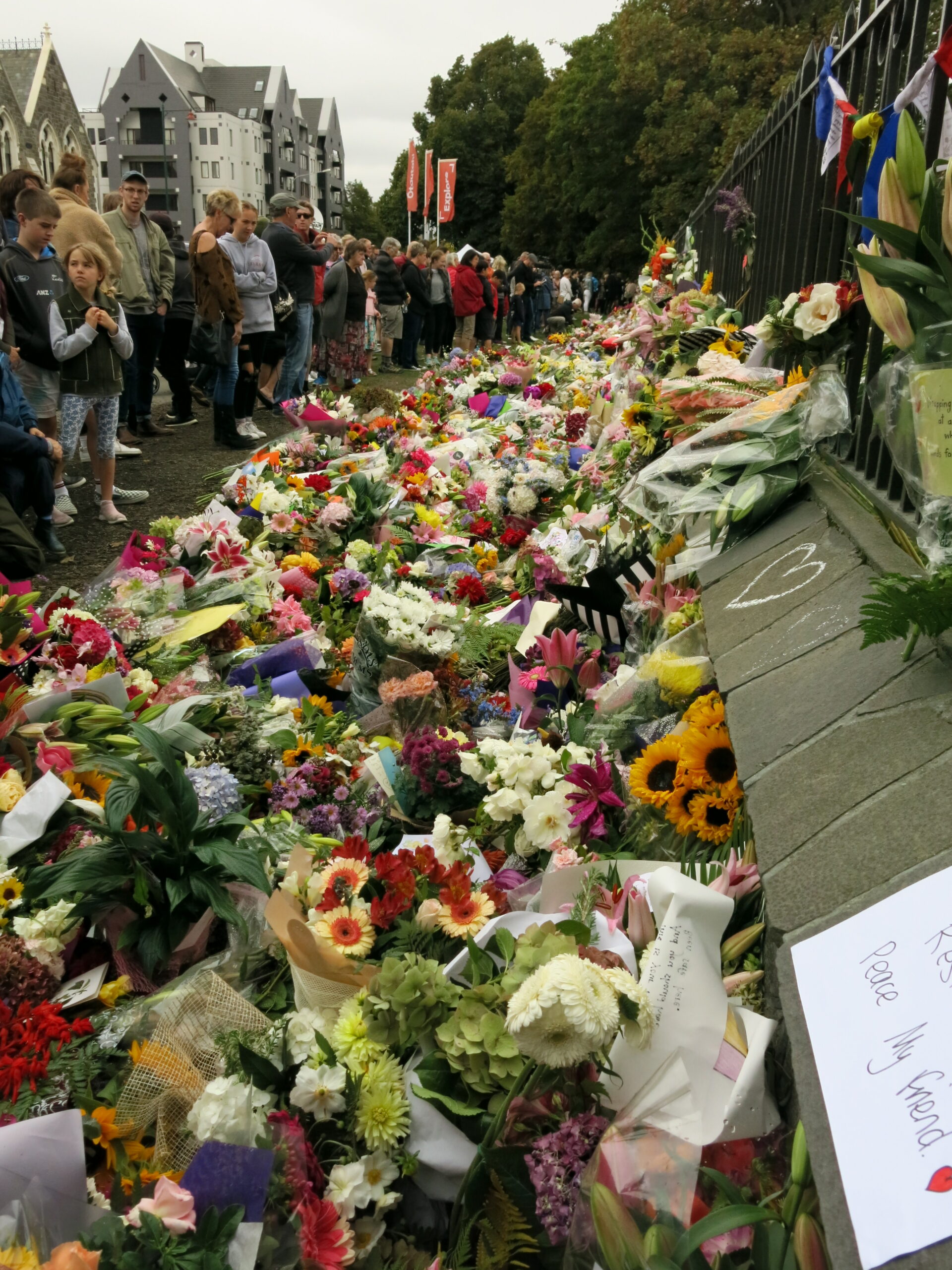 Flowers and handwritten tributes left for the victims of the Christchurch mosque shootings on Rolleston Avenue, Christchurch, New Zealand