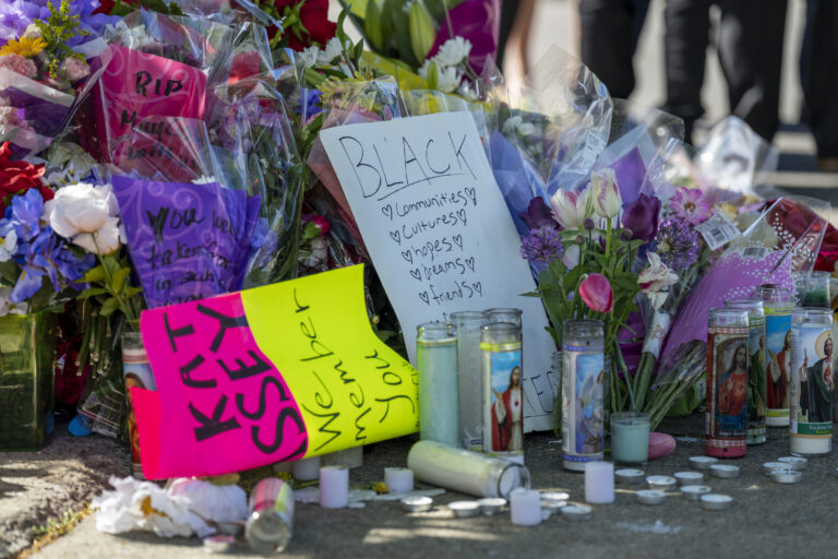 Flowers and tributes at the memorial to the victims of the Tops supermarket shooting on Jefferson Avenue in Buffalo, New York