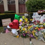 Flowers, stones and eleven Stars of David placed as memorials outside the Tree of Life synagogue in Pittsburgh